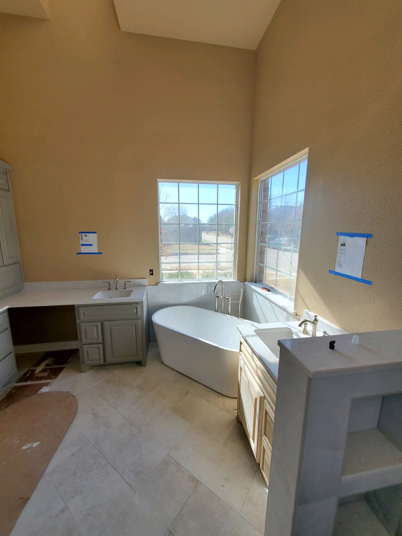 Custom corner tub and cabinetry, an example of specialty interior features