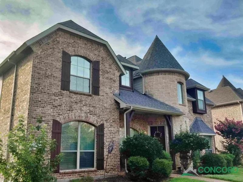 Finished storm damage roof and gutter replacement on a home in Allen, TX