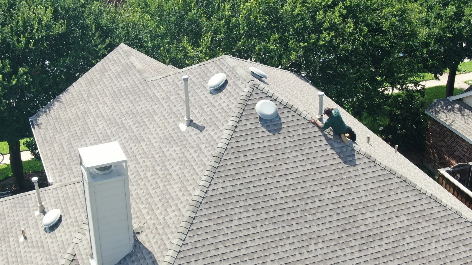 Close-up of a roof valley and flashing checked during a roof inspection