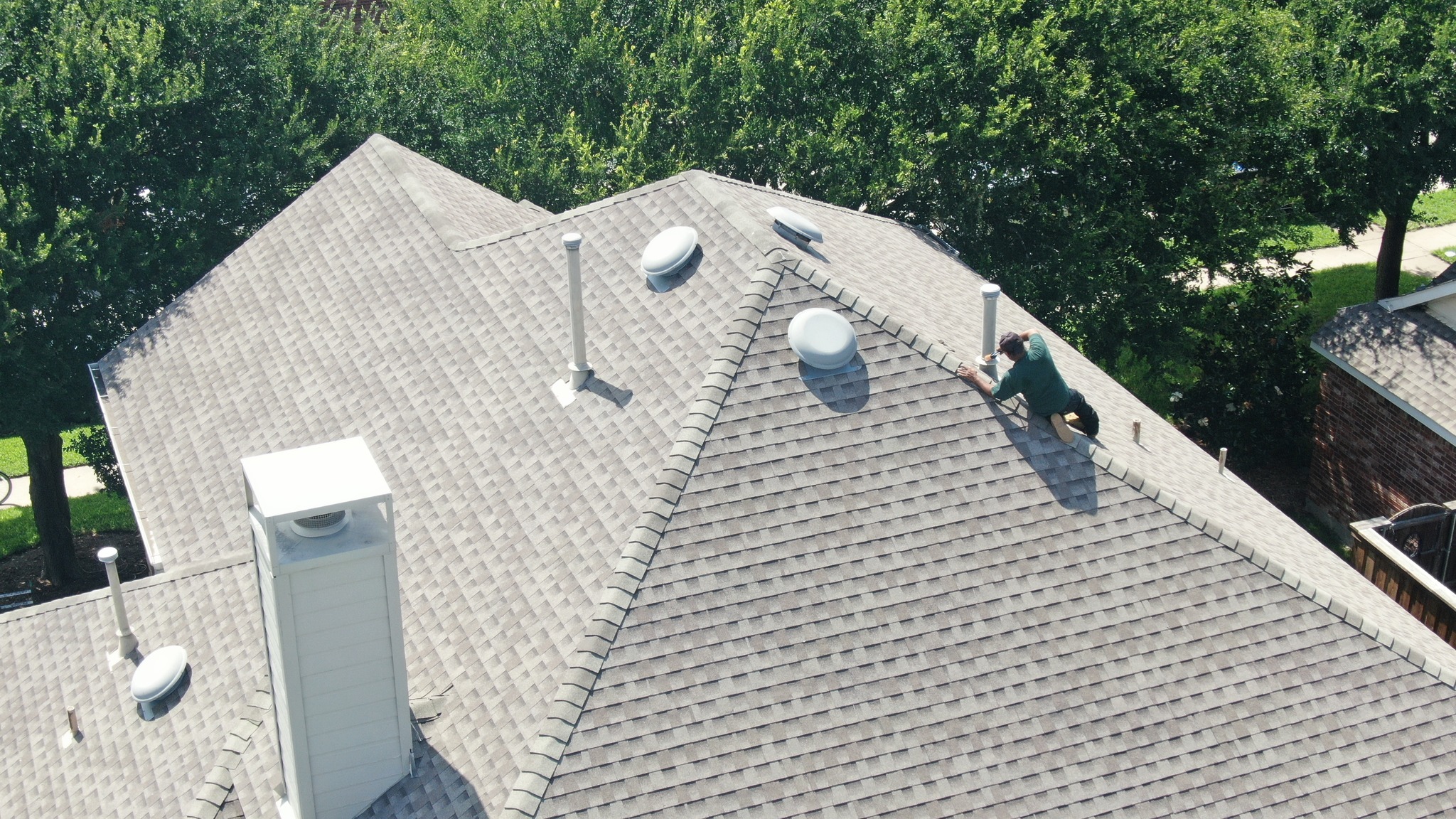 Close-up of roof valley flashing for storm damage assessment